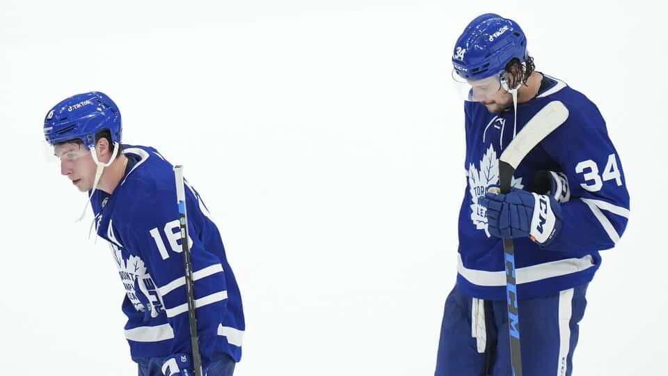 Forwards Mitch Marner and Auston Matthews are looking down after their Saturday loss.