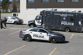 Toronto Police investigate after one man was killed and another wounded by gunfire in a parking lot at Morningside Rd. and Sheppard Ave. E. on Saturday, May 7, 2022.