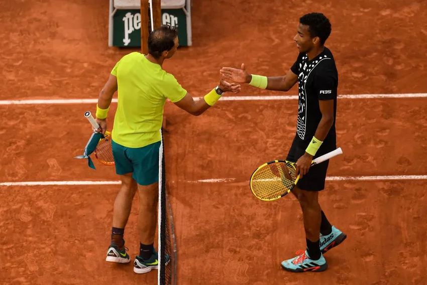 After just his third French Open five-setter, 13-time champion Rafael Nadal takes a moment with worthy Canadian opponent Félix Auger-Aliassime in Paris on Sunday.