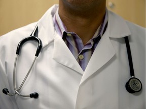 MIAMI, FL - JUNE 02: A doctor wears a stethoscope as he sees a patient for a measles vaccination during a visit to the Miami Children's Hospital on June 02, 2014 in Miami, Florida.  The Centers for Disease Control and Prevention last week announced that in the United States they are seeing the most measles cases in 20 years as they warned clinicians, parents and others to watch for and get vaccinated against the potentially deadly virus.  (Photo by Joe Raedle/Getty Images) XMIT ORG: 495558035