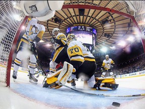 A first period shot from Andrew Copp of the New York Rangers gets past Louis Domingue of the Pittsburgh Penguins in Game 2 of the First Round of the 2022 Stanley Cup Playoffs at Madison Square Garden on May 5, 2022 in New York City.