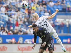 Real Salt Lake's Jasper Loffelsend (28) challenges CF Montréal's Romell Quioto during first half MLS soccer action in Montreal on Sunday, May 22, 2022.