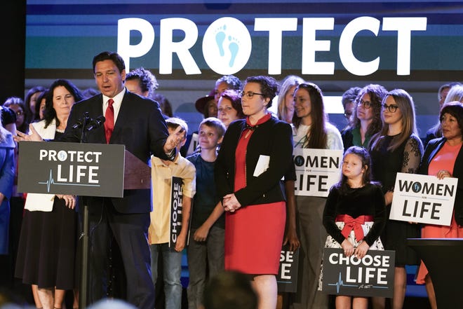 Governor Ron DeSantis is shown speaking to supporters before signing a 15-week abortion ban into law on April 14, 2022. News of a US Supreme Court ruling to end federal protections for abortions could weaken federal and state privacy rights.  (AP Photo/John Raoux)