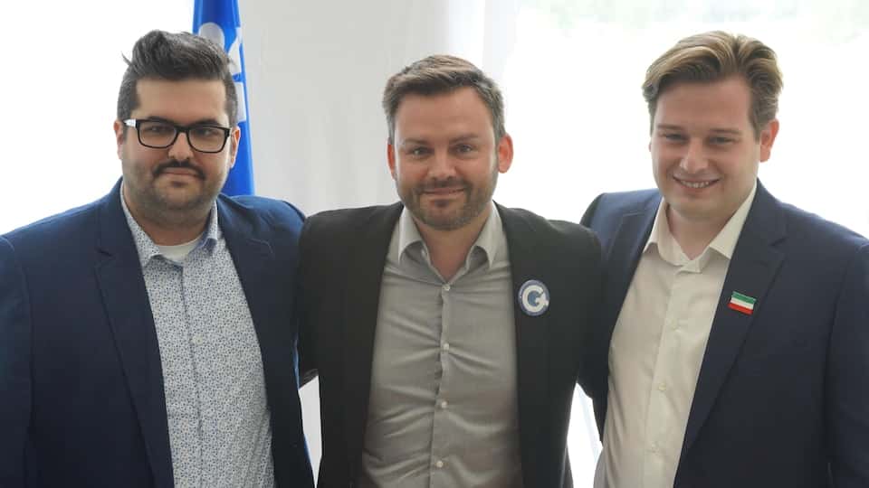 PQ leader Paul Saint-Pierre Plamondon is pictured with the two candidates for the nomination in Rimouski-Neigette, Marc-André Plante and Samuel Ouellet.