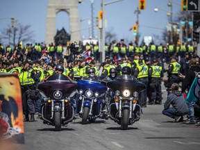 The Ottawa 'Rolling Thunder' motorcycle rally rolled through downtown Ottawa on a controlled route along Elgin Street on Saturday, April 30, 2022.
