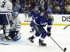 Tampa Bay Lightning center Brayden Point (21) celebrates after scoring on Leafs goalie Jack Campbell during sudden-death overtime in Tampa, Fla., Thursday night.  (AP Photo/Chris O'Meara)