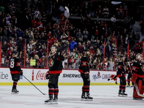 Ottawa Senators captain Brady Tkachuk and teammates salute the announced crowd of 17,102 after their last home game of the season at Canadian Tire Center on April 28, 2022.