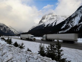FILE PHOTO: Trucks on a snowy Trans Canada Highway in BC