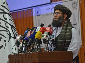 Taliban minister for Promotion of Virtue and Prevention of Vice Mohammad Khalid Hanafi speaks during a ceremony to announce the decree for Afghan women's dress code in Kabul, Saturday, May 7, 2022.