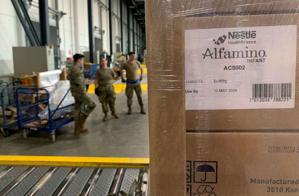 PHOTO: Soldiers load boxes of baby formula ready for the first shipments to the US from Europe at the US ARMY base in Ramstein, Germany, on May 21, 2022.
