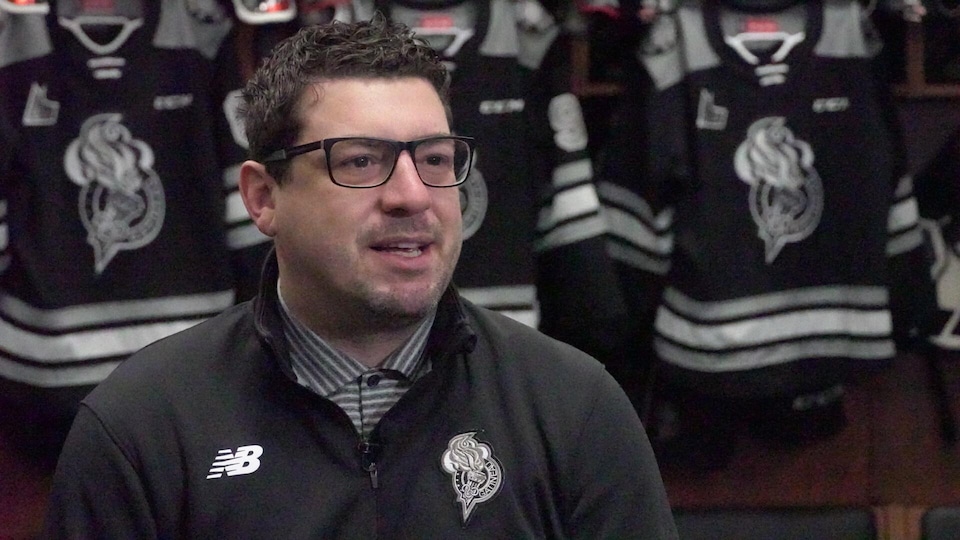 Louis Robitaille interviewed in the Olympiques locker room.