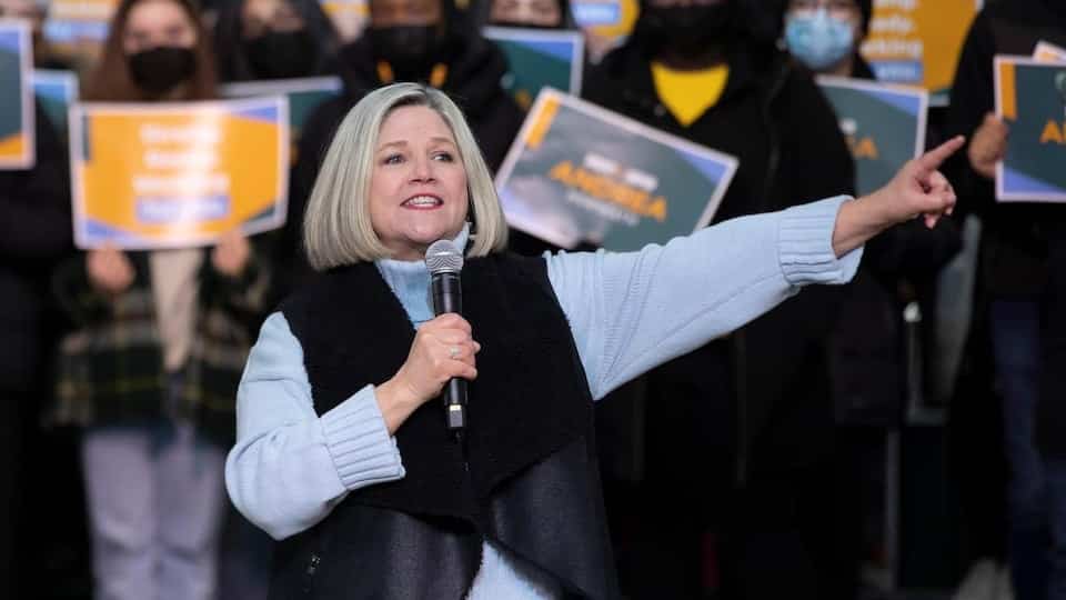 Andrea Horwath speaks on the microphone during a campaign rally.
