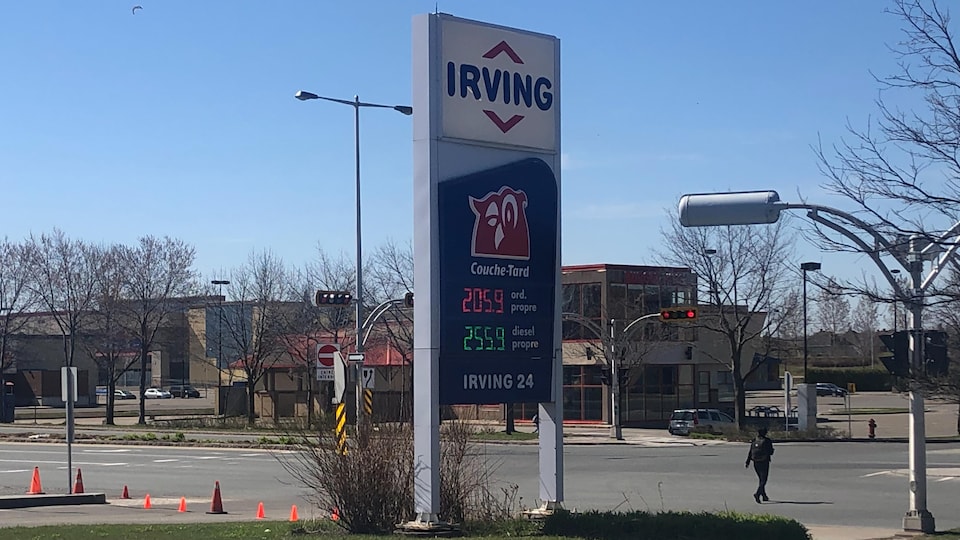 The sign of an Irving gas station in the spring.
