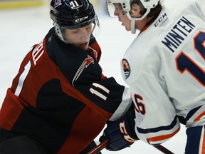 Vancouver Giants' Fabian Lysell, left,