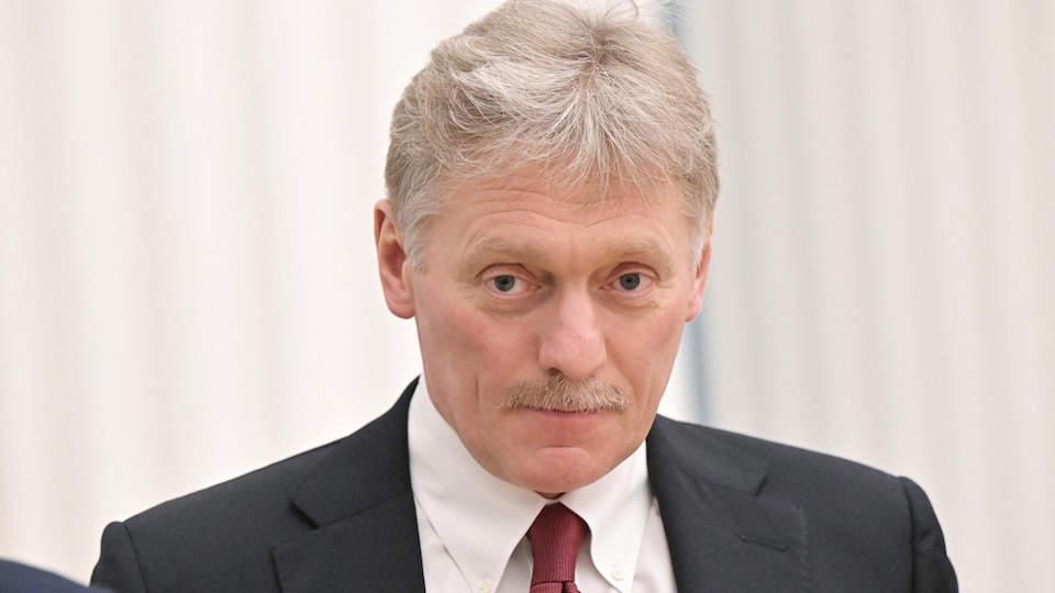 Dmitry Peskov, Kremlin spokesman, looking directly at the camera during a conference in February. 