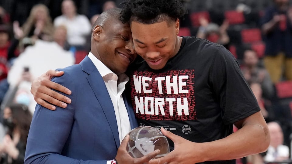 Masai Ujiri presented the Rookie of the Year trophy to Scottie Barnes.