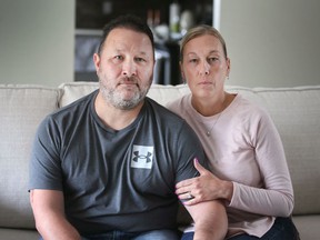 Underground worker Joe Bosley, shown with his wife Jodie at their Amherstburg home on March 1, 2022, feels the ,000 fine levied Monday against his employer does not adequately address the severity of his on-the-job injuries sustained in in a 2020 industrial accident at K+S Windsor Salt.
