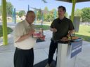 Ward 5 Coun.  Ed Sleiman was presented Thursday with an appreciation plaque for all the work he's done for the Ford City neighborhood by Ford City BIA chair Shane Potvin during a ceremony to celebrate 0,000 in improvements to Garry Dugal Park.    