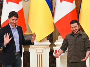 Ukrainian President Volodymyr Zelenskyy and Prime Minister Justin Trudeau gesture during a joint press conference in Kyiv on May 8, 2022 amid the Russian invasion of Ukraine.