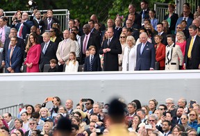 Catherine, Duchess of Cambridge, Prime Minister Boris Johnson, Mike Tindall, Prince Louis of Cambridge, Princess Charlotte of Cambridge, Prince George of Cambridge, Prince William, Duke of Cambridge, Camilla, Duchess of Cornwall, Prince Charles, Prince of Wales, Princess Anne, Princess Royal and Sir Timothy Laurence during the Platinum Pageant on June 5, 2022 in London.
