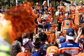 Mayor Amarjeet Sohi leads a cheer during an Edmonton Oilers fan rally held at Sir Winston Churchill Square to cheer the Oilers' playoff journey in Edmonton on May 24, 2022.