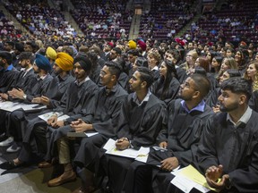 Graduates attend the St. Clair College Convocation at the WFCU Center, on Wednesday, June 8, 2022.