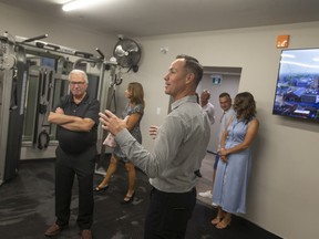 Developer Brent Klundert shows the gym area during a tour on Thursday of The Hive during a grand opening ceremony.