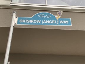 The street blade for Okîsikow Way, formerly 101A Avenue between 96 Street and 97 Street, was designed by artist Gloria Neapetung.