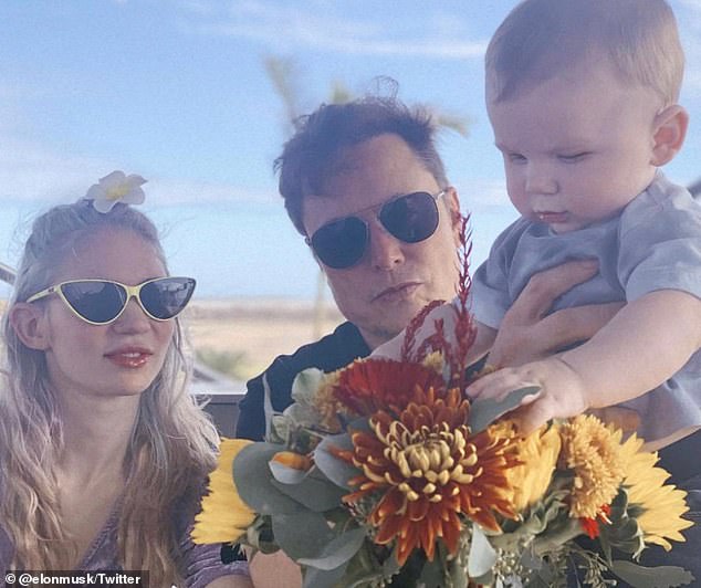 Musk and Grimes with their son X, photographed in March 2021