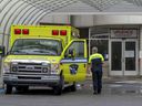 An ambulance parked outside the Lakeshore General Hospital emergency department.  The public was told on Friday evening, June 10, 2022, to avoid the hospital because of staff shortages