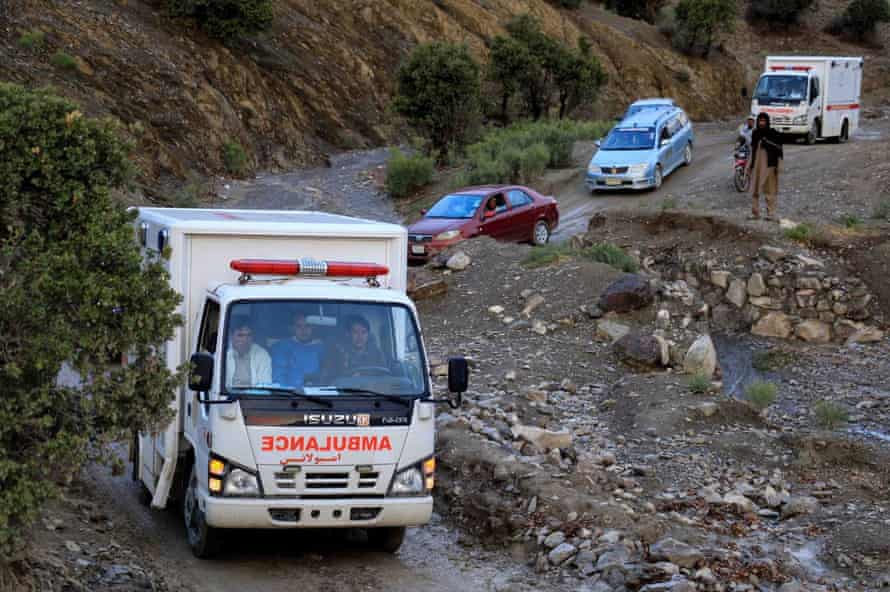 An ambulance carries earthquake victims to the hospital in Paktika province.