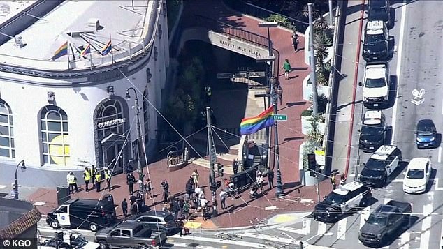 Police cars are seen lining up outside the busy Castro Street station Wednesday morning following reports of a shooting aboard a commuter train.