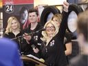 Dani Probert pumps her fist in the air to celebrate the Bob Probert Ride raising  million in eight years on Wednesday, April 24, 2019, at Thunder Road Harley-Davidson.  The annual ride, which began the year after NHL legend Bob Probert (Dani's husband) died of a heart attack, raises money for cardiac services in Windsor and Essex County.