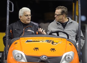 Province columnist Ed Willes (right) puts BC Lions head coach Wally Buono on the spot in an interview at BC Place Stadium in November 2011, the month in which the Lions won the most recent of their six Gray Cup championships.