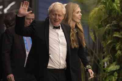 Boris Johnson and his wife Carrie attended a banquet at the Commonwealth summit in Kigali, Rwanda, last night