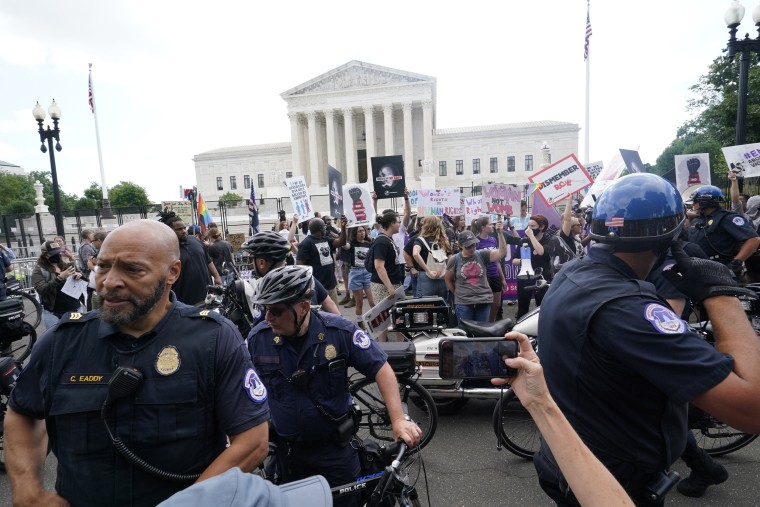 Demonstrators for the right to abortion and against abortion protest