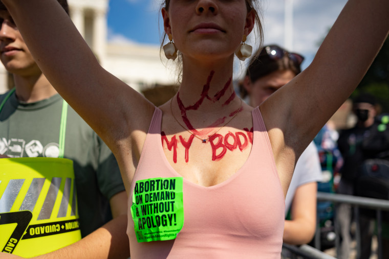 An abortion rights protester protests outside the Supreme Court in Washington, on June 24, 2022.