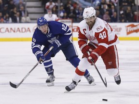 Wings' Henrik Zetterberg is chased by Connor Brown as Maple Leafs host the Detroit Red Wings in Toronto on Tuesday March 7, 2017. Michael Peake/Toronto Sun/Postmedia Network