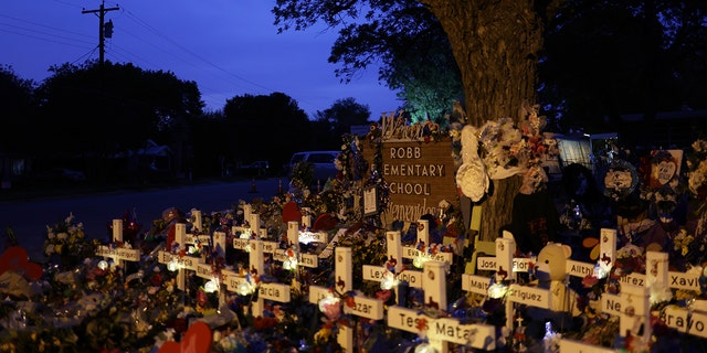 Wooden crosses are placed at a memorial dedicated to the victims of the mass shooting at Robb Elementary School on June 3, 2022 in Uvalde, Texas.  19 students and two teachers were killed on May 24 after an 18-year-old gunman opened fire inside the school.  Wakes and funerals for the 21 victims are scheduled throughout the week.  