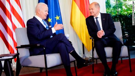 German Chancellor Olaf Scholz, right, welcomes US President Joe Biden, left, for a bilateral meeting at Castle Elmau in Kruen, near Garmisch-Partenkirchen, Germany, on Sunday, June 26. of 2022. 