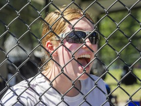 Pitcher Morgan Reimer, cheering on her BC team during Canada Cup play at Softball City on Sunday, is aiming for an NCAA scholarship once she graduates from high school in two years time.