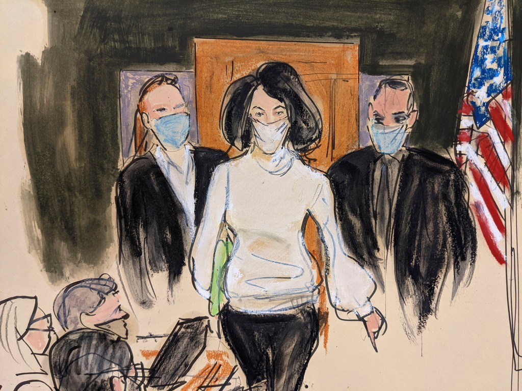 Ghislaine Maxwell enters the courtroom escorted by US Marshalls at the start of her trial on November 29, 2021 in New York. 