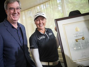 Brooke Henderson received the key to the city from Ottawa Mayor Jim Watson on Tuesday.