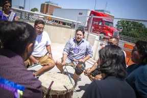 First Nations drummers chant during a ceremony and protest that briefly halted international traffic across the Ambassador Bridge on Tuesday.