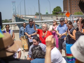 First Nations members hold a ceremony on a portion of the Ambassador Bridge on Tuesday, June 28, 2022. The Jay Treaty Border Alliance is meeting in Windsor to discuss cross border travel for Indigenous people living on both sides of the border.
