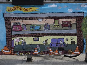 An art installation mounted in front of The Depot Community Center on Somerled Ave. in NDG, features two large works in acrylic on fabric illustrating what members of the Depot's Social Justice Club say are common experiences for renters, including unsanitary conditions, overcrowding and renovic- tions.