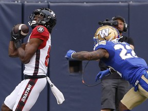 Ottawa Redblacks' Shaq Johnson (88) catches the pass for a touchdown against Winnipeg Blue Bombers' Tyqwan Glass (22) during the first half of CFL action in Winnipeg, Friday, June 10, 2022.