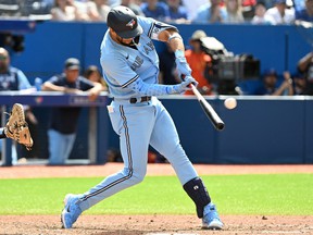 Toronto Blue Jays left fielder Lourdes Gurriel Jr. hits a grand slam home run against the New York Yankees in the sixth inning at Rogers Center on June 19, 2022 in Toronto.