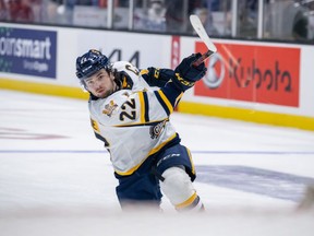 Mavrik Bourque (22) of the Shawinigan Cataractes scores against the Hamilton Bulldogs at the 2022 Memorial Cup on June 23, 2022, at Harbor Station in Saint John, NB.