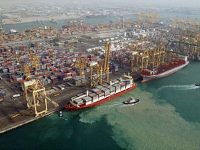 An aerial view of the Jebel Ali port, a harbor with sixty-seven berths south of Dubai, the world's largest manmade port.